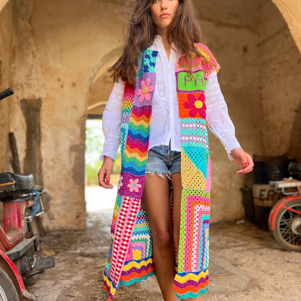
                  
                    MANTEAU SANS MANCHES COUTURE
                  
                
